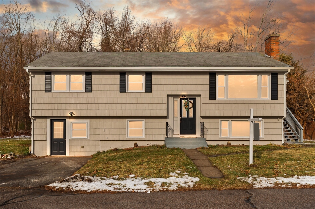 front view of a house with a yard