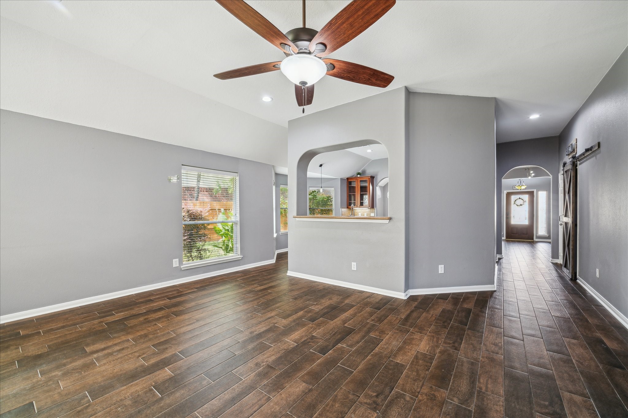 20910 Sandy Briar Court Spring, TX 77379 - Photo 11 of 28 View of the open space to the kitchen area from living room