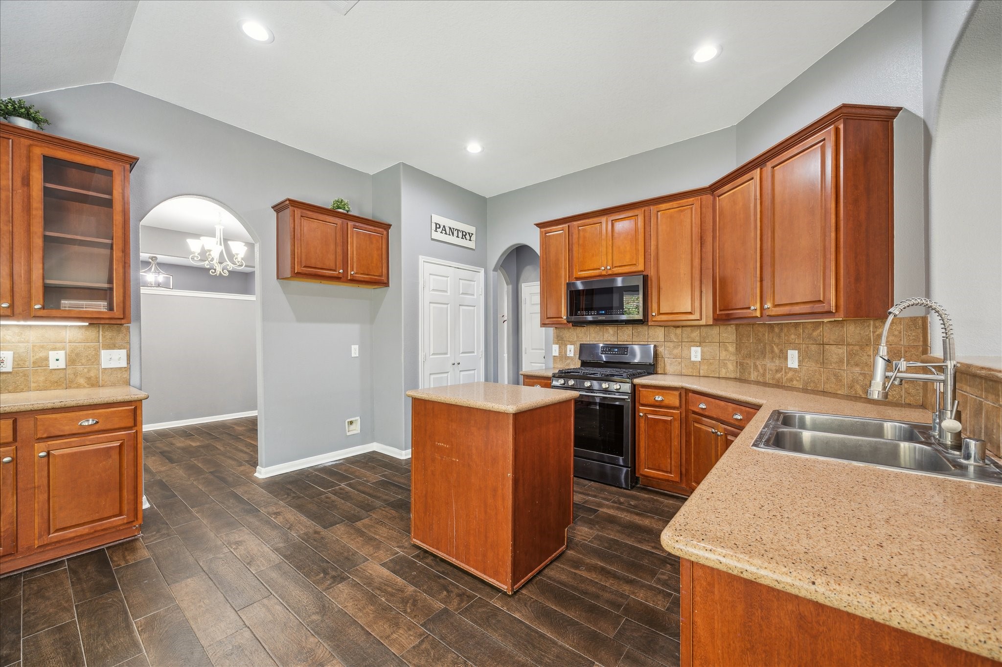 20910 Sandy Briar Court Spring, TX 77379 - Photo 13 of 28 Spacious Kitchen with Cozy Breakfast Nook