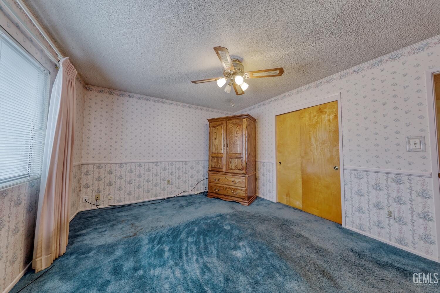 Undisclosed Address Tehachapi, CA 93561 - Photo 31 of 47 a view of empty room with ceiling fan