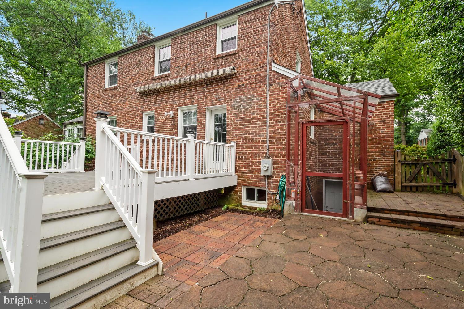9505 St Andrews Way Silver Spring, MD 20901 - Photo 25 of 30 a view of a house with a yard