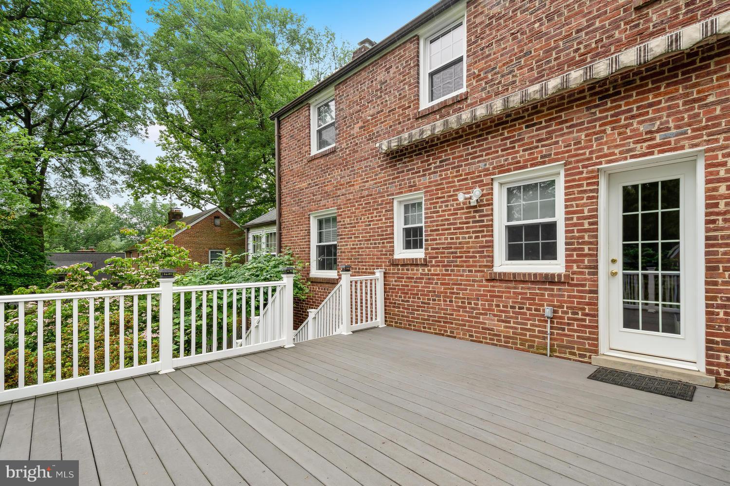 9505 St Andrews Way Silver Spring, MD 20901 - Photo 26 of 30 a view of a house with wooden deck