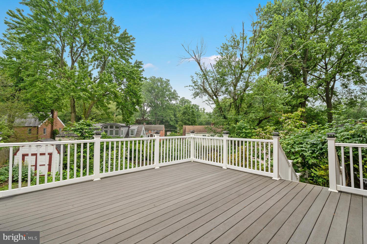 9505 St Andrews Way Silver Spring, MD 20901 - Photo 27 of 30 a view of backyard with deck and wooden floor