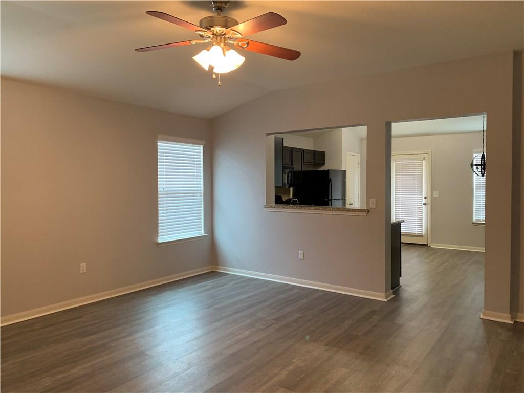 351 Musgrav Kyle, TX 78640 - Photo 4 of 21 a view of empty room with wooden floor and fan