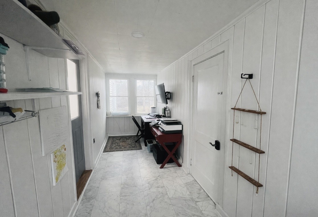 299 West Shellsford Road McMinnville, TN 37110 - Photo 27 of 34 a view of hallway with furniture and a refrigerator