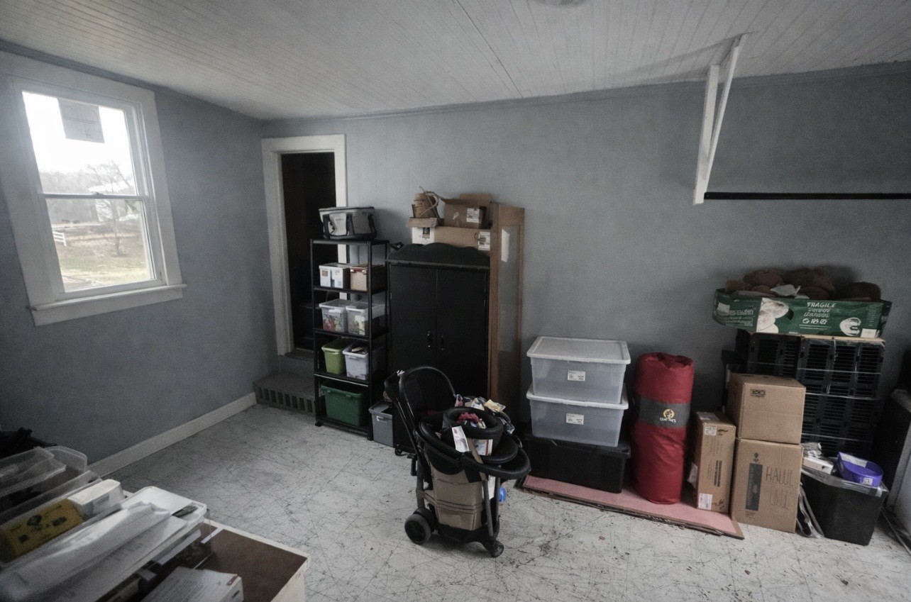 299 West Shellsford Road McMinnville, TN 37110 - Photo 31 of 34 a room with storage and utility