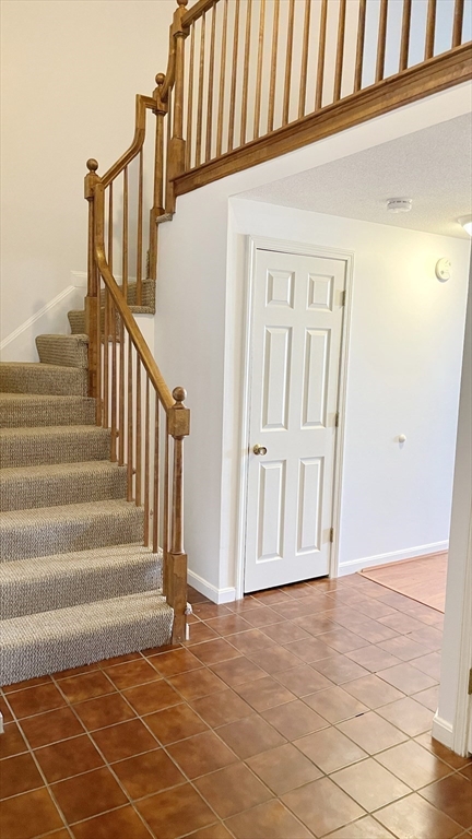 200 Market Street, Unit 505 Lowell, MA 01852 - Photo 10 of 22 a view of an entryway with staircase