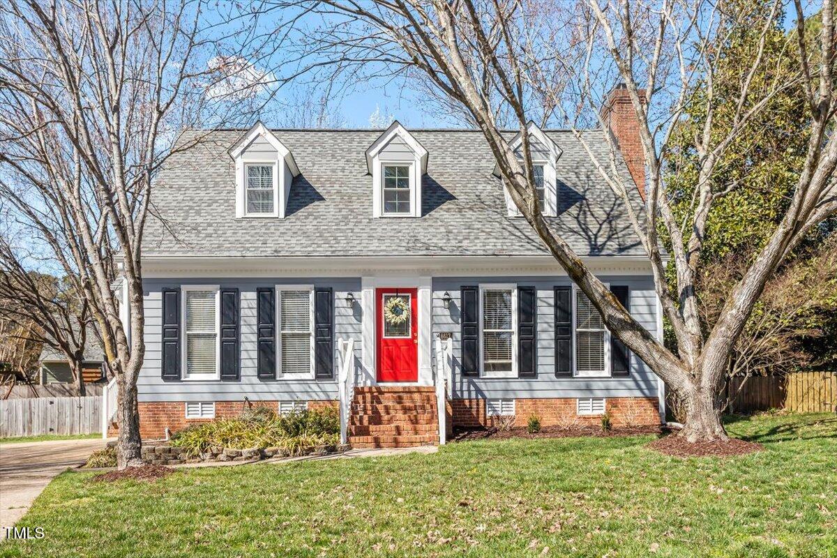 8617 Canoe Court Raleigh, NC 27615 - Photo 1 of 40 a view of house with a yard