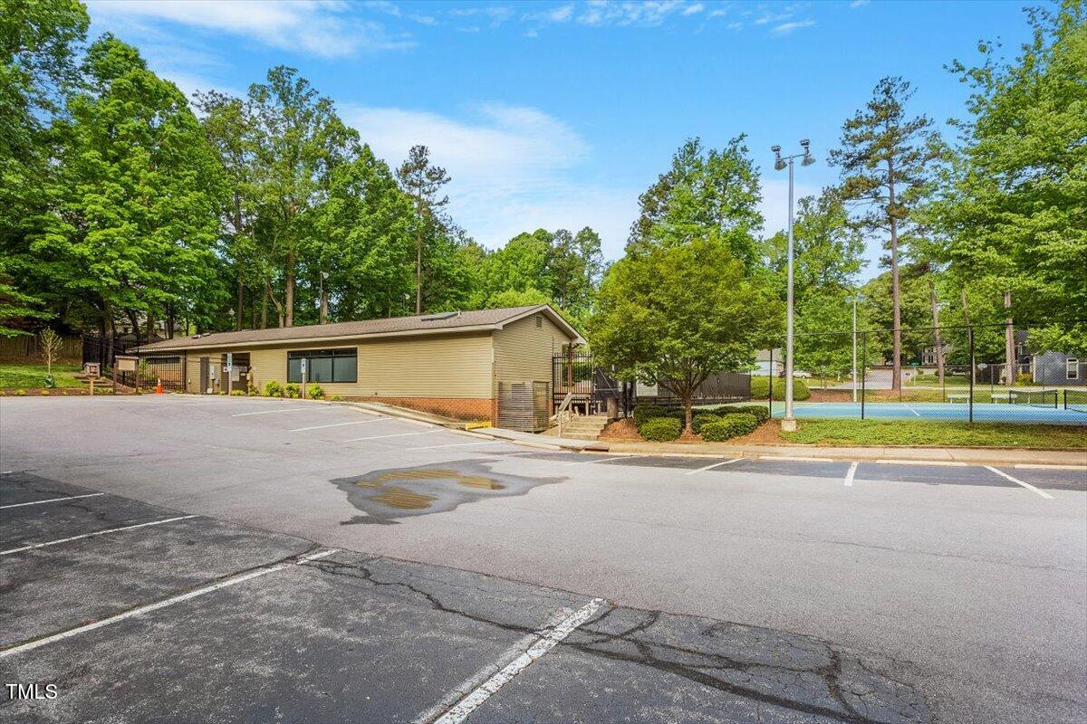 8617 Canoe Court Raleigh, NC 27615 - Photo 38 of 40 a view of a house with pool and a yard