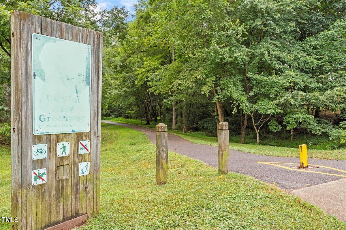 8617 Canoe Court Raleigh, NC 27615 - Photo 39 of 40 a view of a park with slide