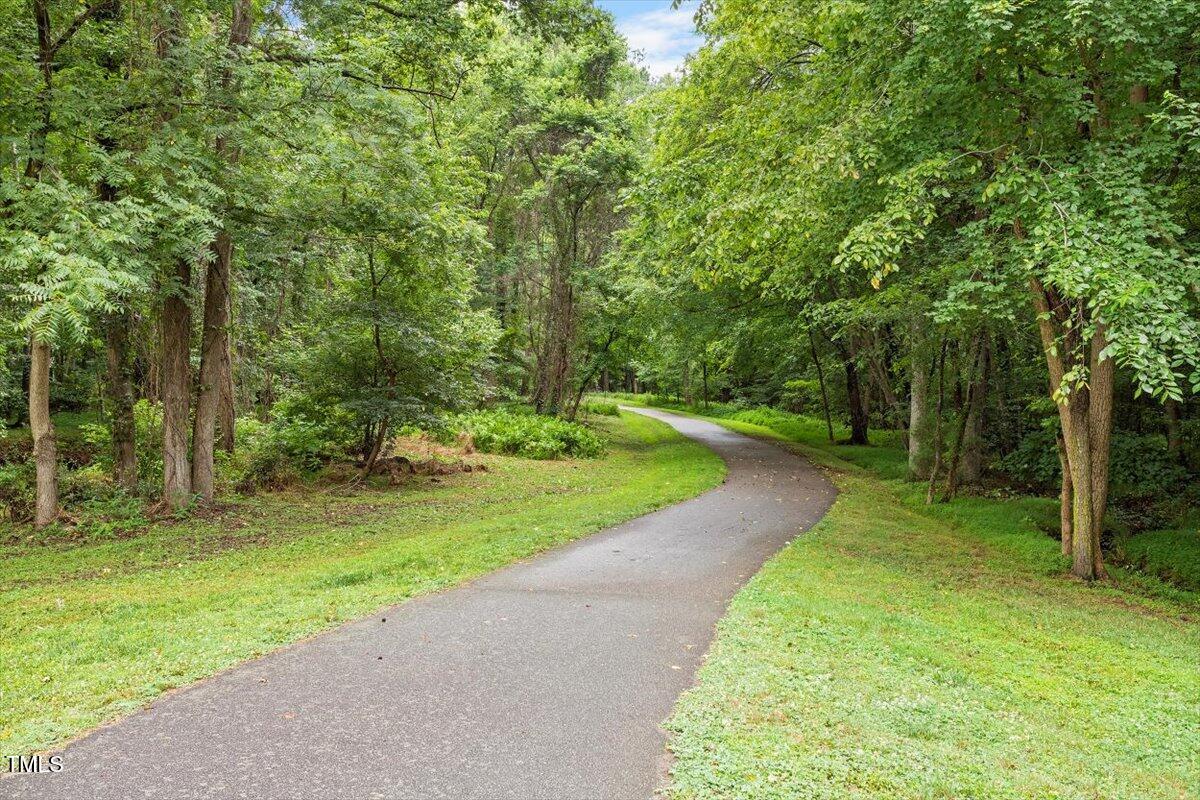 8617 Canoe Court Raleigh, NC 27615 - Photo 40 of 40 a view of a park with large trees