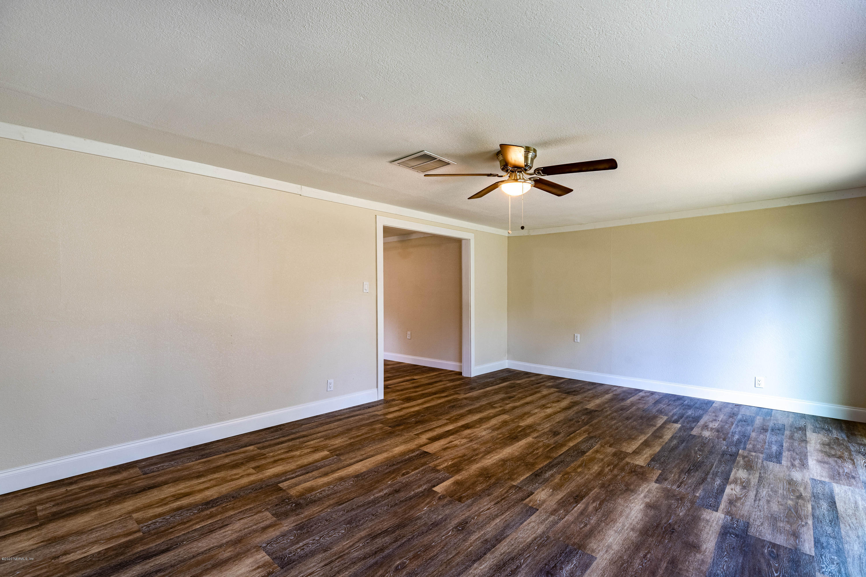 620 Southwest Field Avenue Keystone Heights, FL 32656 - Photo 20 of 68 a view of room with a ceiling fan