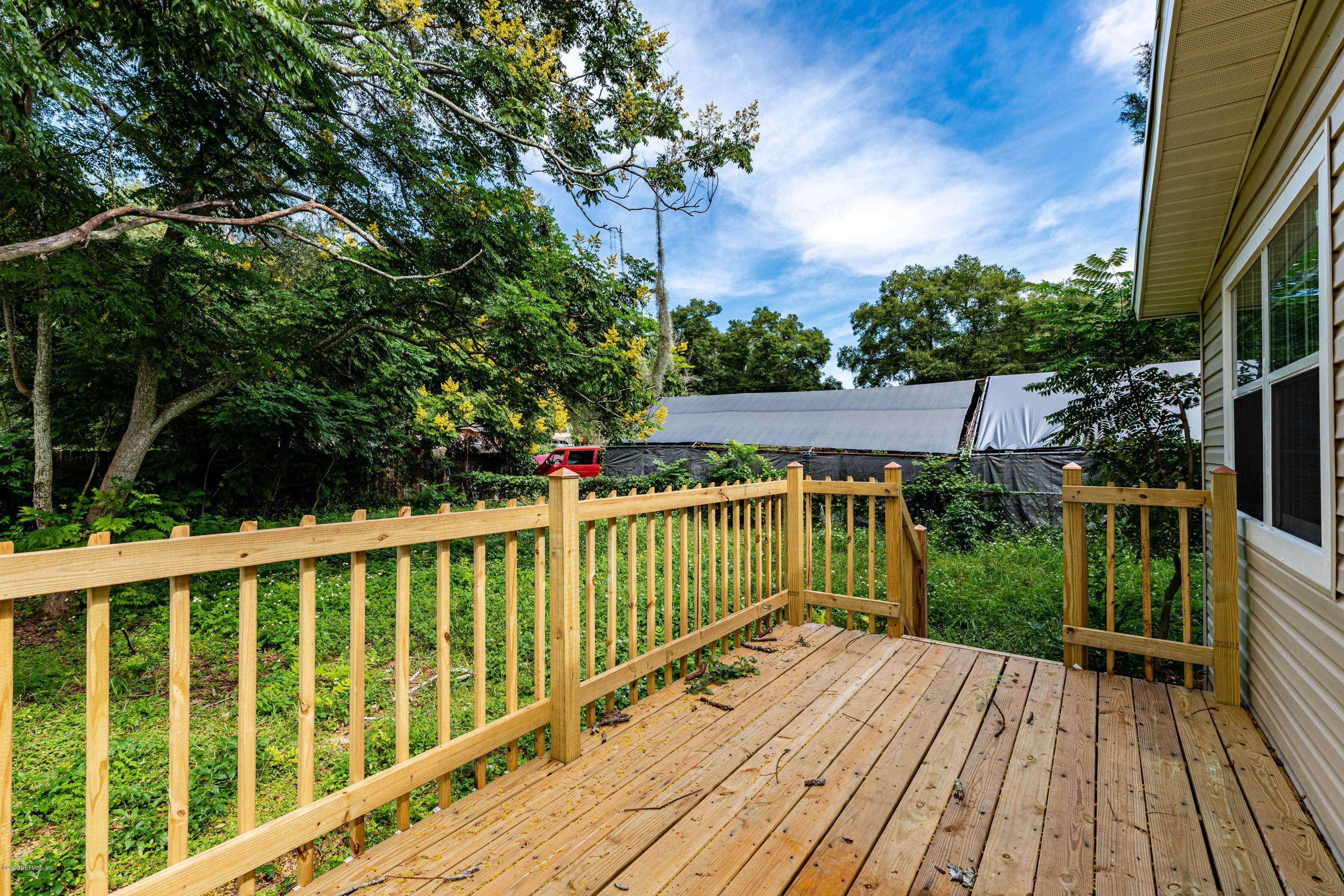 620 Southwest Field Avenue Keystone Heights, FL 32656 - Photo 33 of 68 a view of balcony with wooden floor and fence