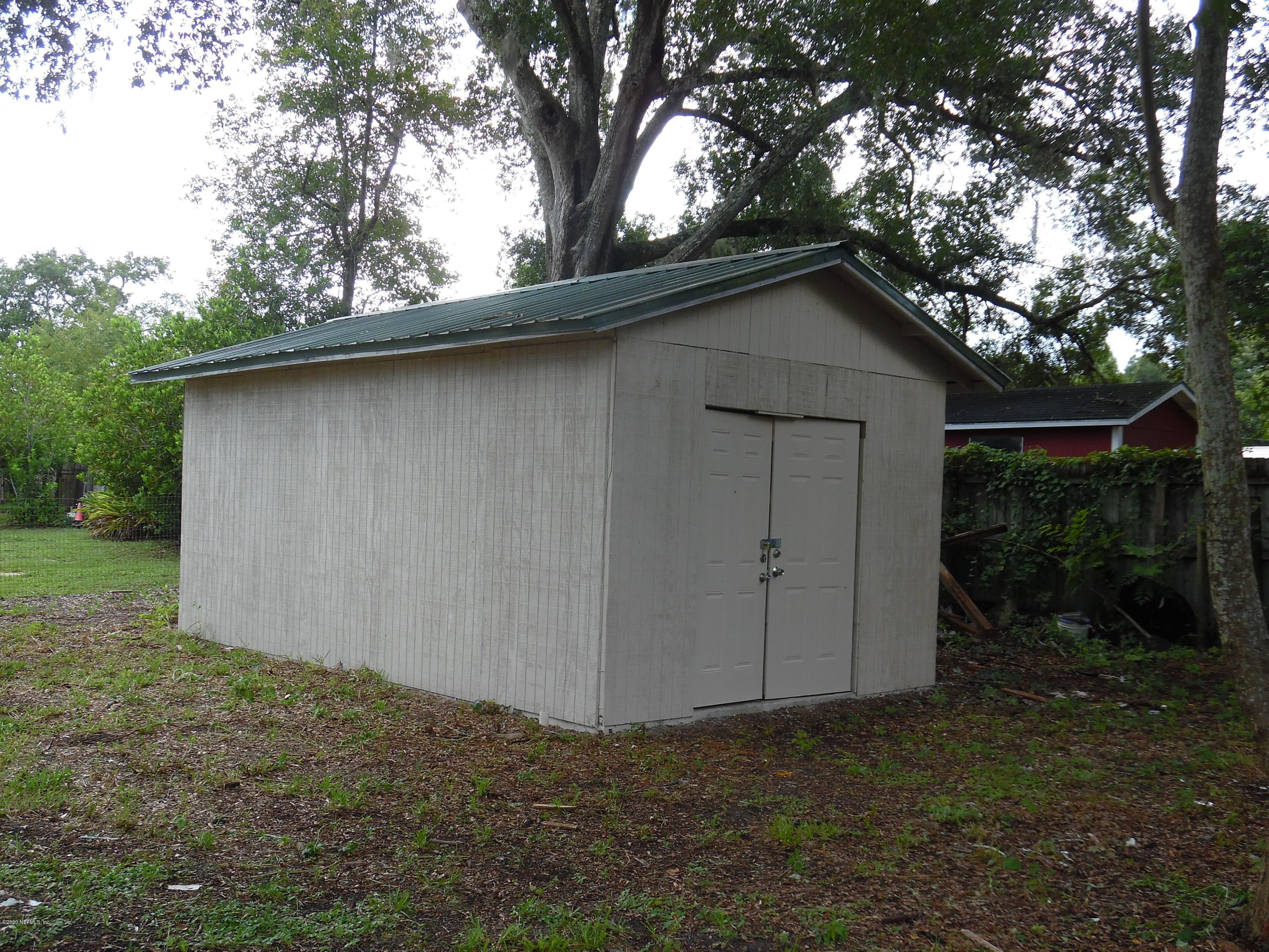 620 Southwest Field Avenue Keystone Heights, FL 32656 - Photo 38 of 68 a backyard of a house