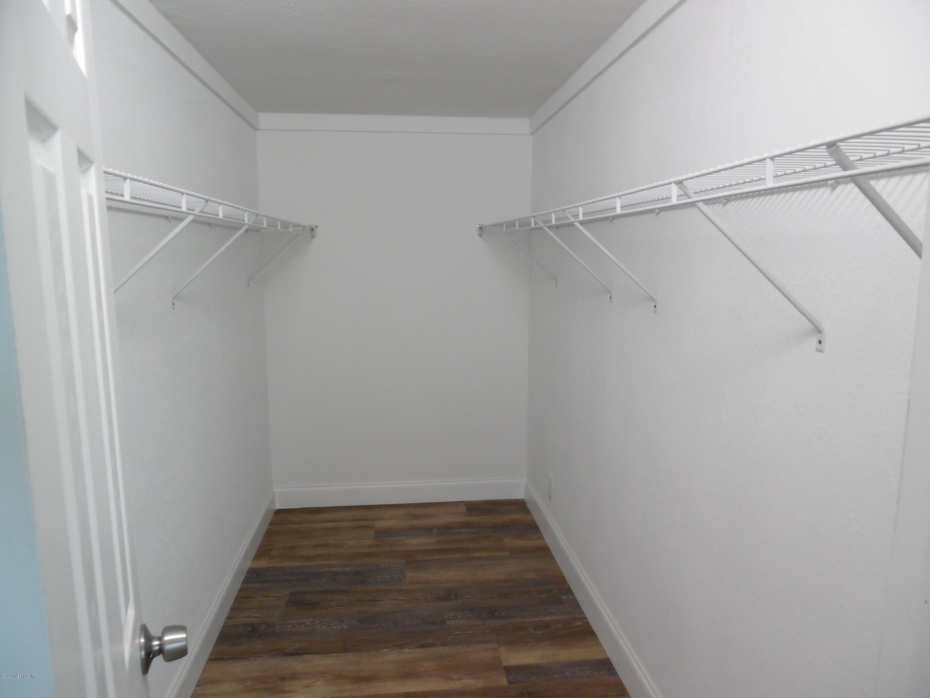 620 Southwest Field Avenue Keystone Heights, FL 32656 - Photo 57 of 68 a view of a room with wooden floor