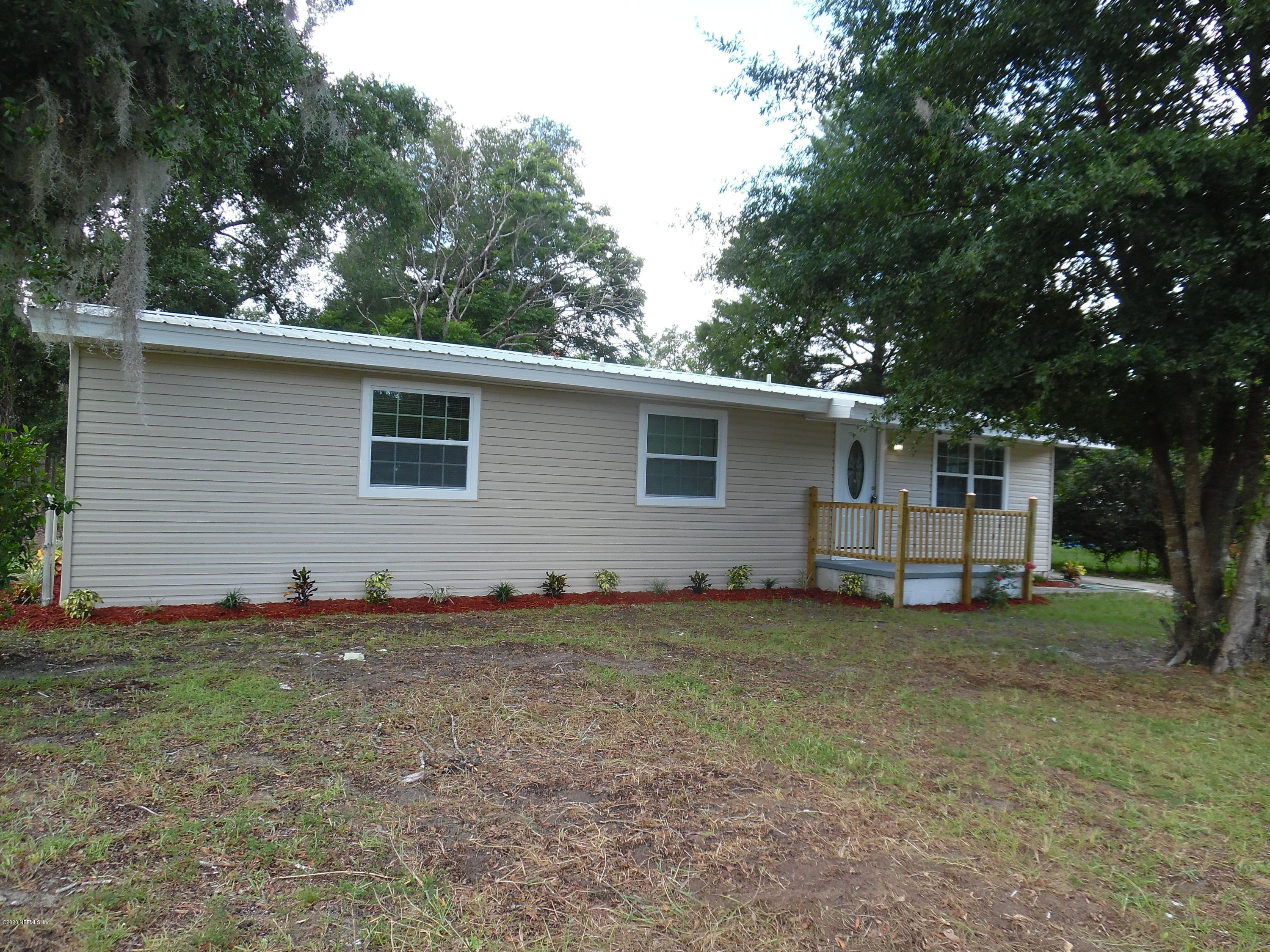 620 Southwest Field Avenue Keystone Heights, FL 32656 - Photo 61 of 68 a view of a house with a yard