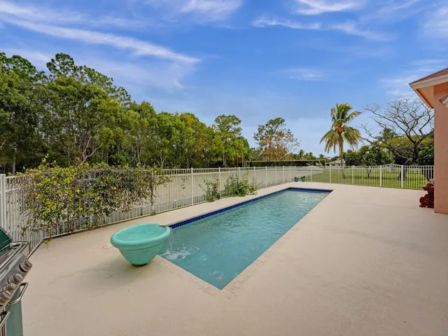 a view of a lake with a yard