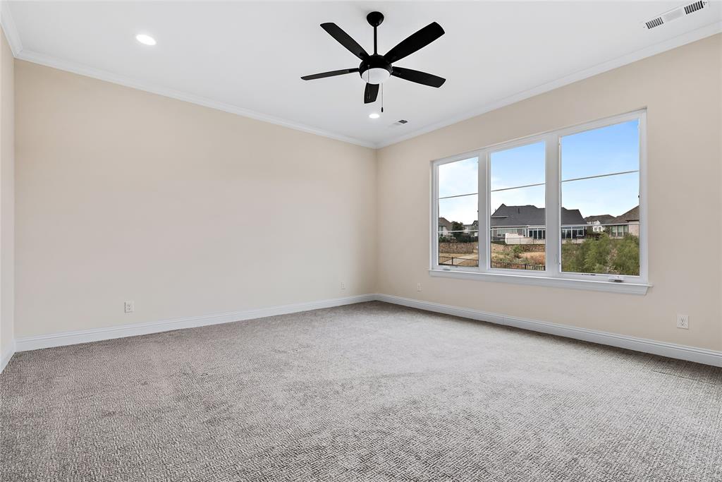1920 Shumard Way Fort Worth, TX 76008 - Photo 13 of 38 an empty room with windows and ceiling fan