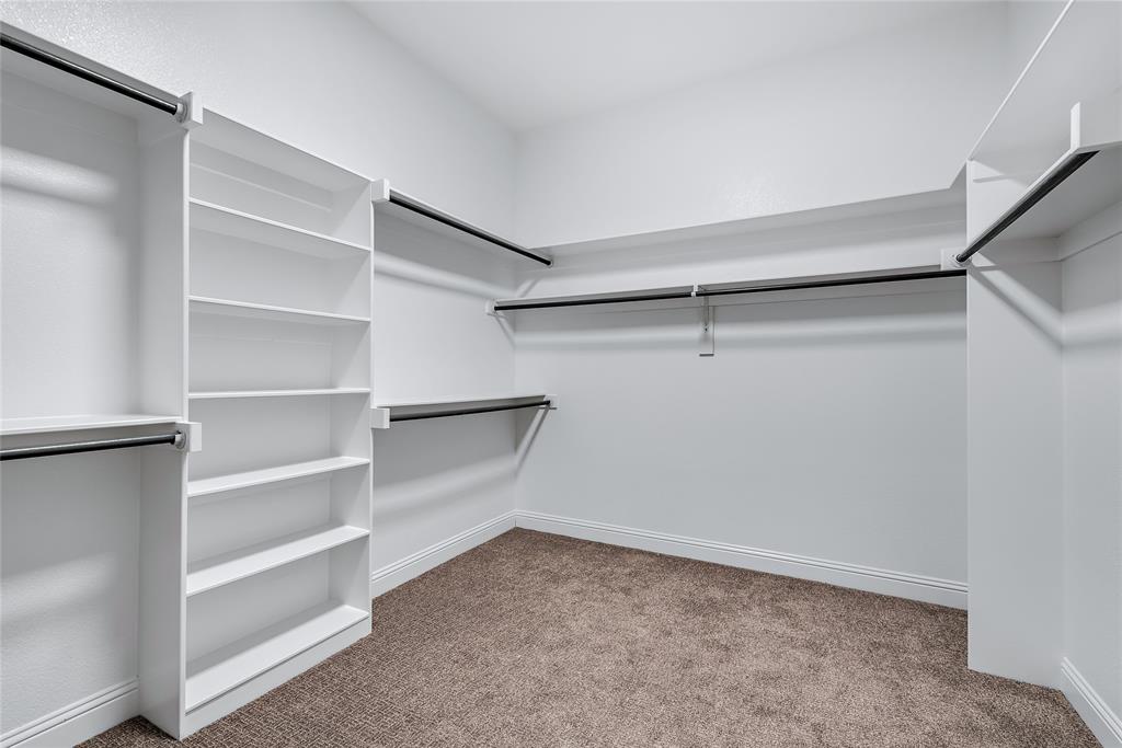 1920 Shumard Way Fort Worth, TX 76008 - Photo 18 of 38 a view of an empty walk in closet