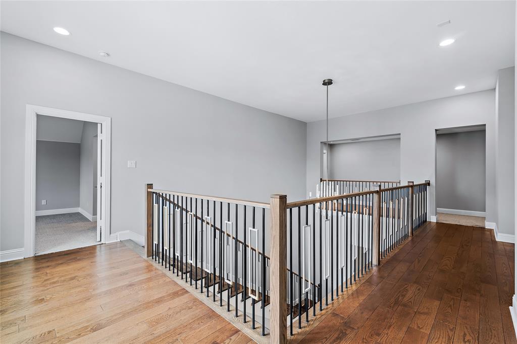 1920 Shumard Way Fort Worth, TX 76008 - Photo 21 of 38 a view of a hallway with wooden floor and a bathroom
