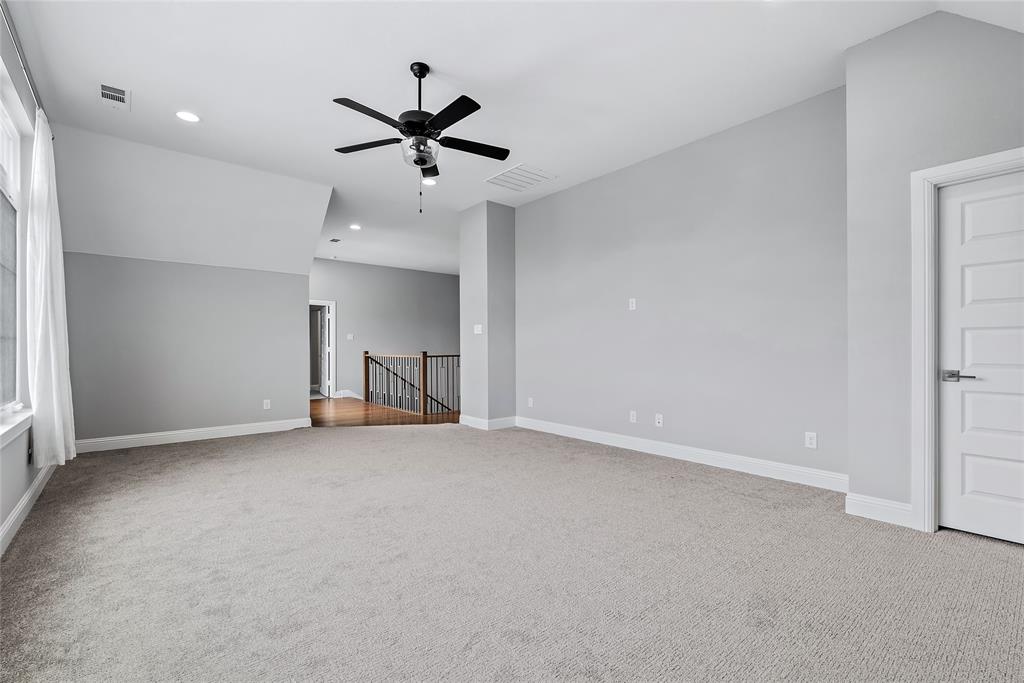 1920 Shumard Way Fort Worth, TX 76008 - Photo 23 of 38 a view of a livingroom with a ceiling fan and window