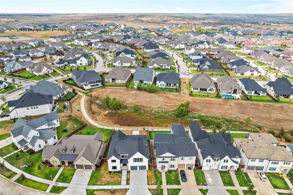 1920 Shumard Way Fort Worth, TX 76008 - Photo 33 of 38 an aerial view of residential building and lake