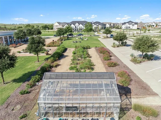 an aerial view of residential building with outdoor space
