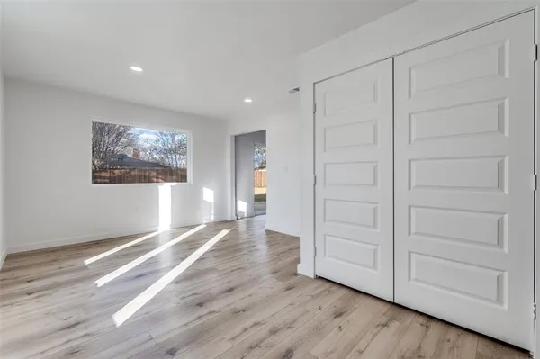 a view of entryway with wooden floor