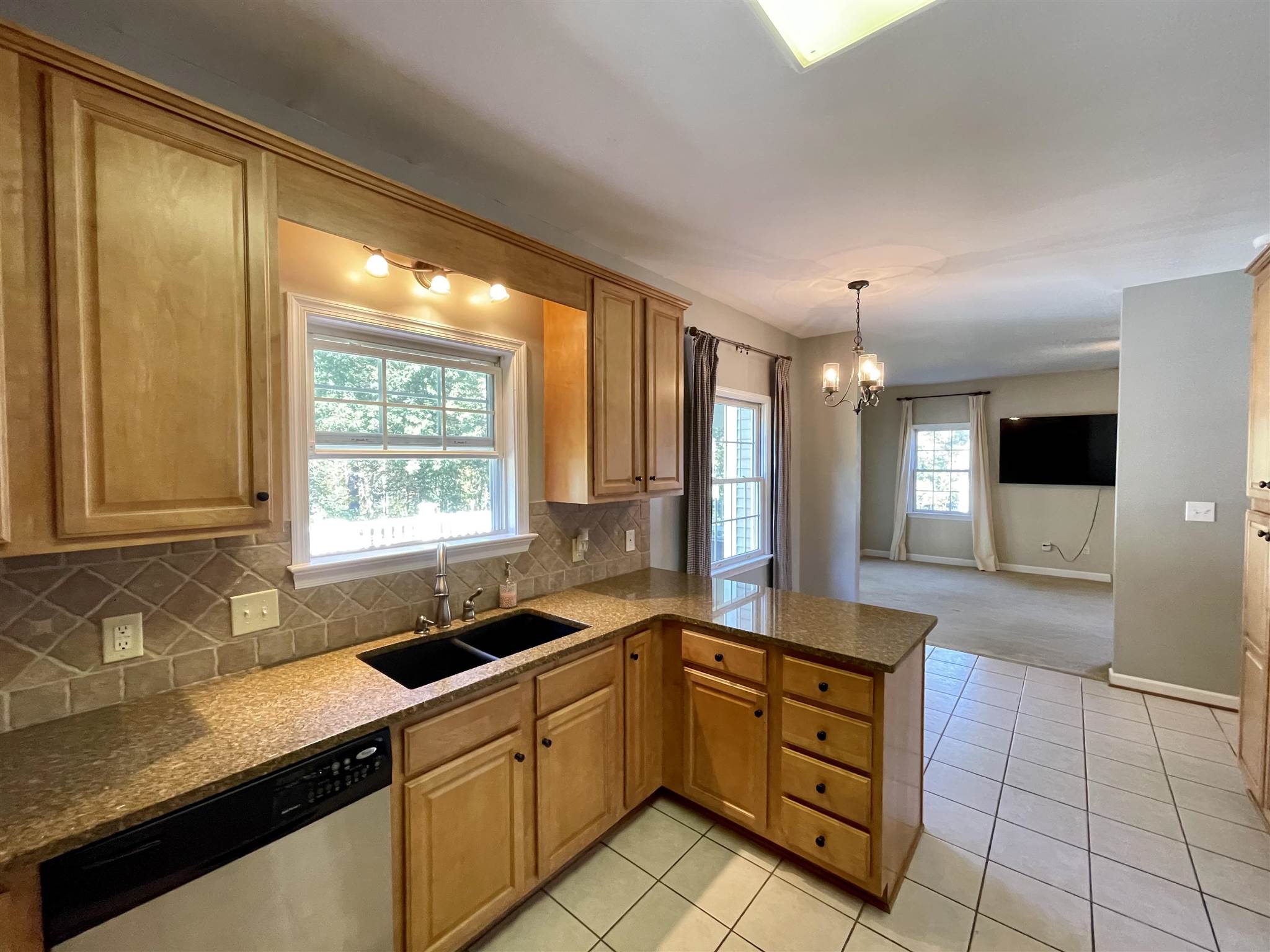 109 Long Bow Road Waynesboro, VA 22980 - Photo 13 of 42 a kitchen with sink cabinets and window