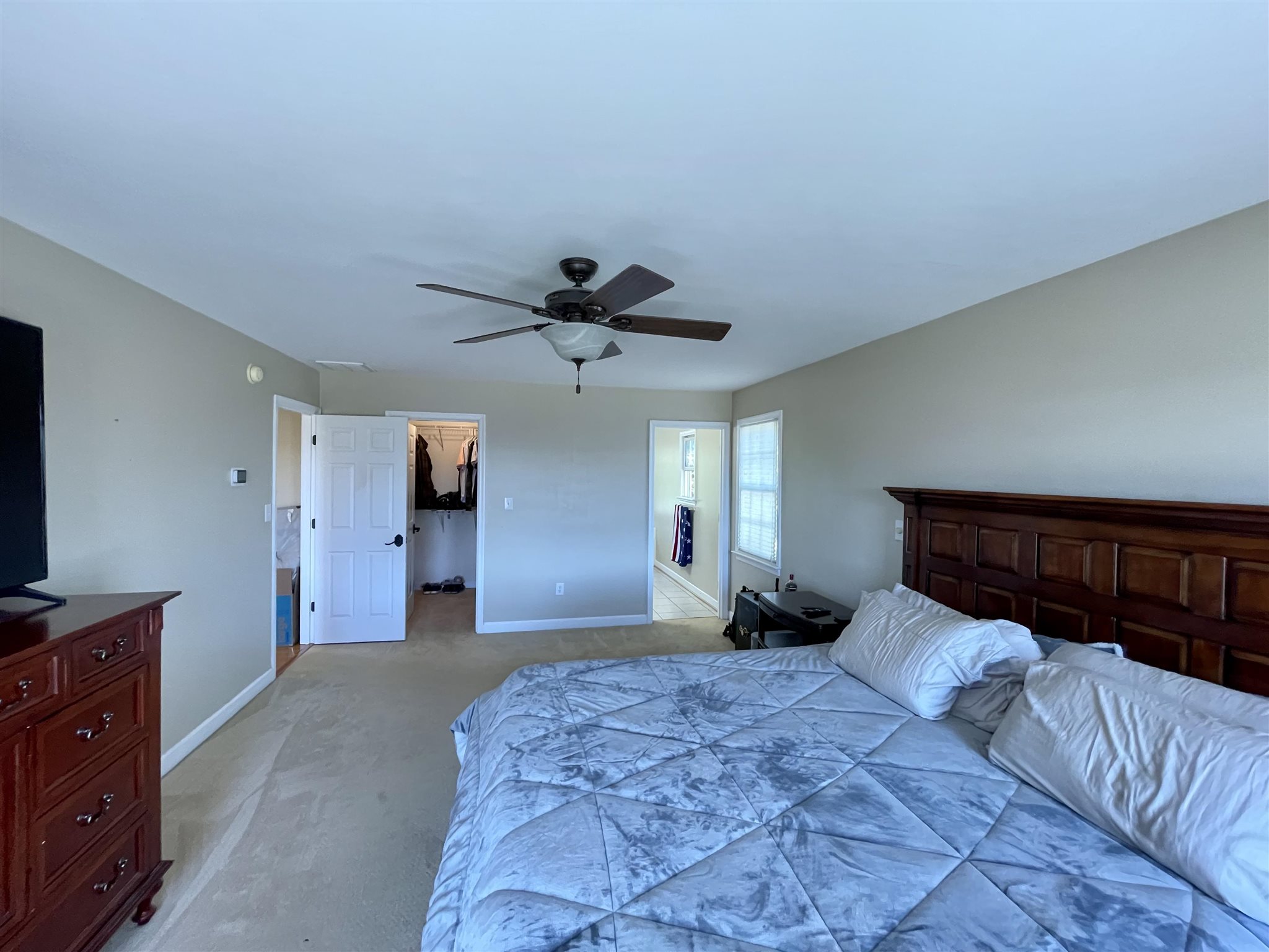 109 Long Bow Road Waynesboro, VA 22980 - Photo 20 of 42 a bedroom with a large bed and a tv