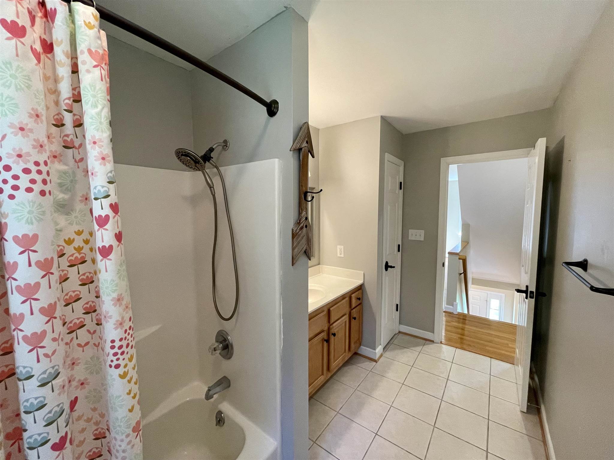 109 Long Bow Road Waynesboro, VA 22980 - Photo 28 of 42 a bathroom with a granite countertop shower curtain and a sink