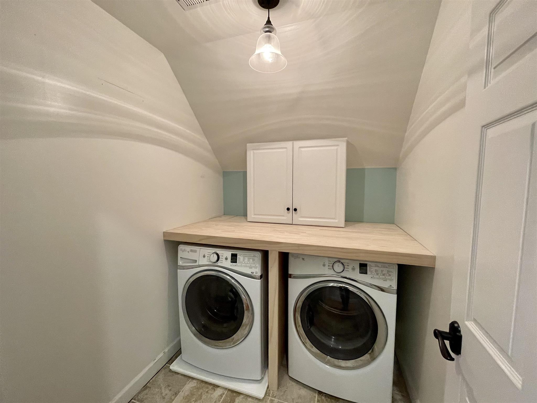 109 Long Bow Road Waynesboro, VA 22980 - Photo 30 of 42 a view of washer and dryer with kitchen in the background