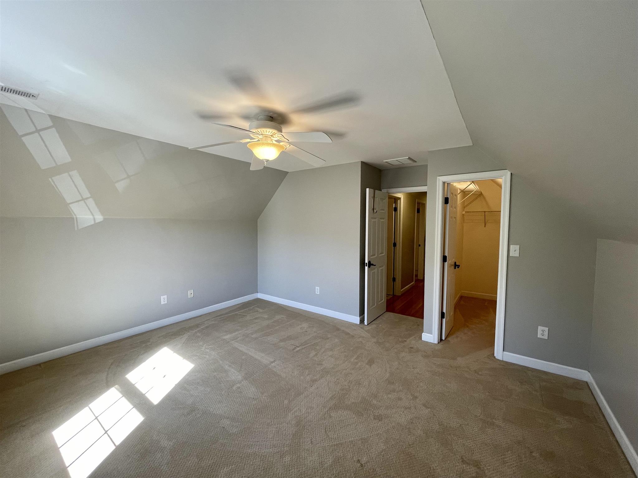 109 Long Bow Road Waynesboro, VA 22980 - Photo 33 of 42 an empty room with windows and fan