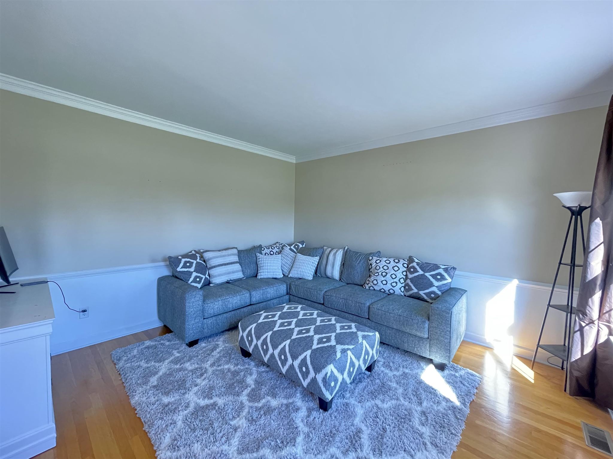 109 Long Bow Road Waynesboro, VA 22980 - Photo 6 of 42 a living room with couches and painting on the wall