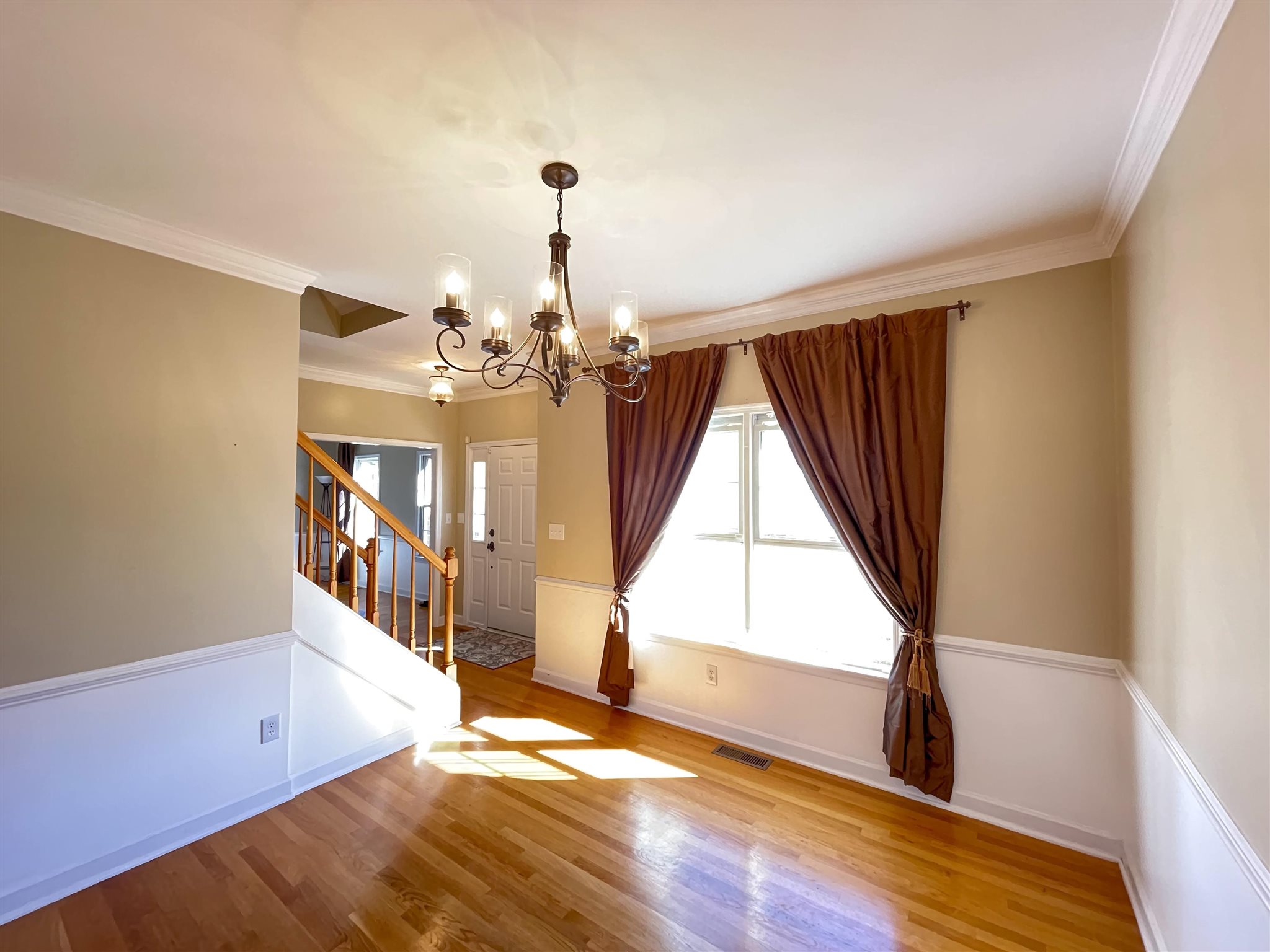 109 Long Bow Road Waynesboro, VA 22980 - Photo 9 of 42 a view of a livingroom with wooden floor and a window