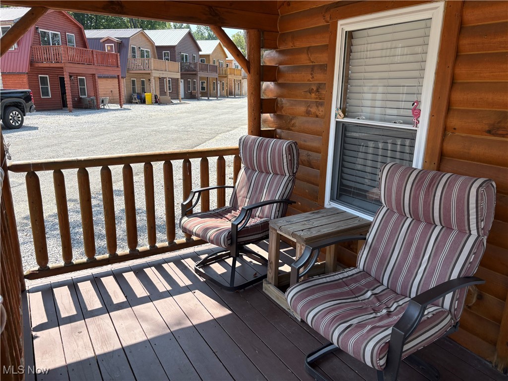 5919 Lake Road West, Unit 13 Ashtabula, OH 44004 - Photo 25 of 35 Deck to relax on