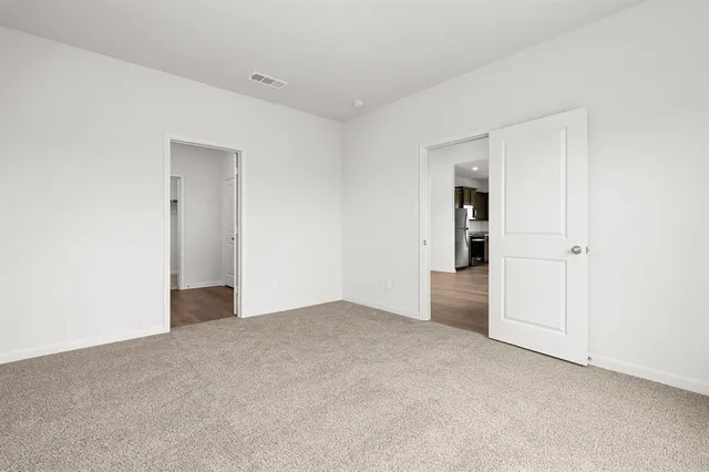 an empty room with an entryway