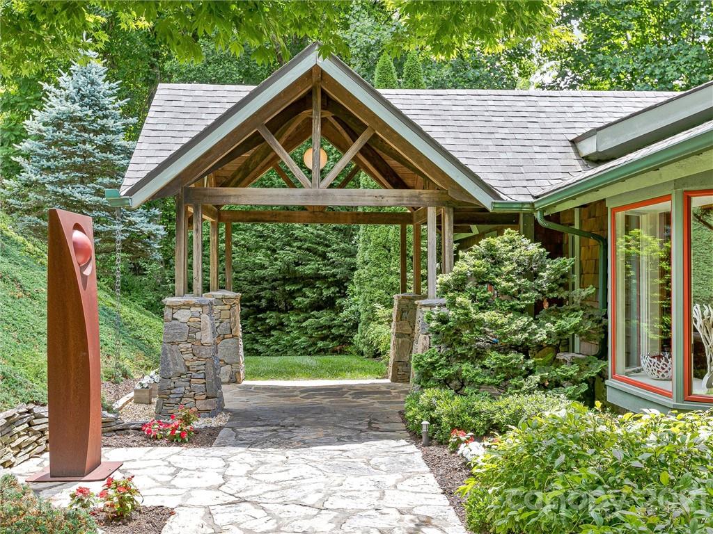 22 Sunset Summit Asheville, NC 28804 - Photo 2 of 42 a front view of a house with a yard