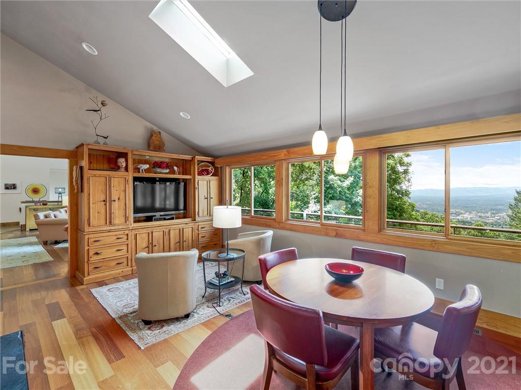 22 Sunset Summit Asheville, NC 28804 - Photo 14 of 42 a view of a dining room with furniture window and outside view