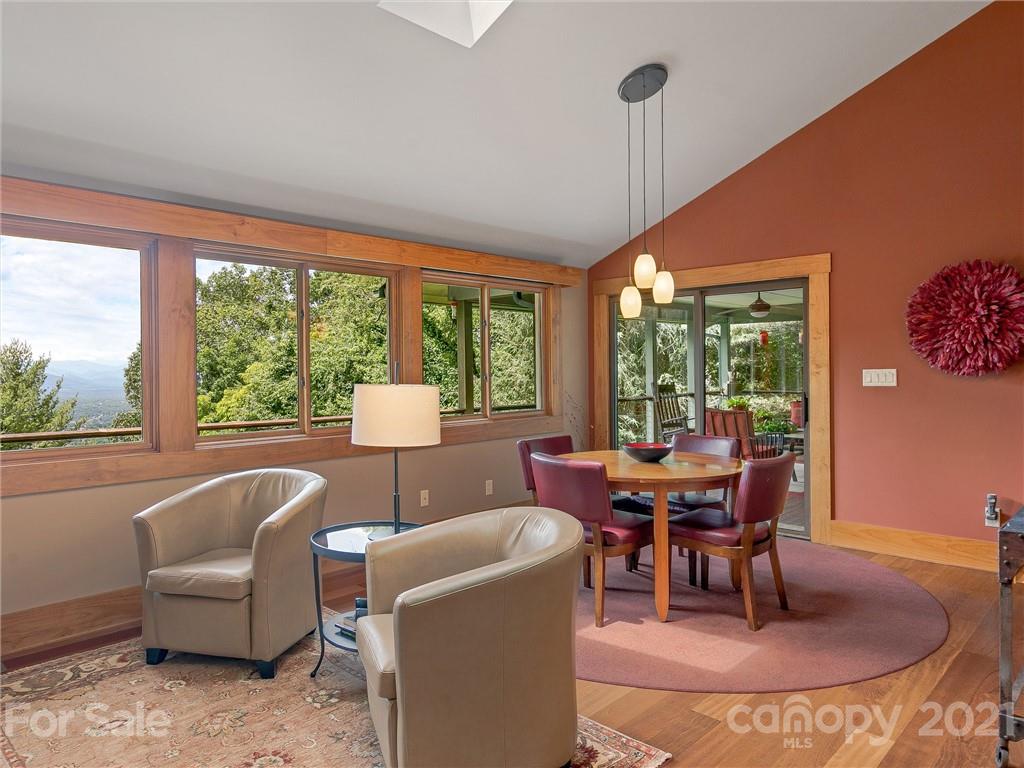 22 Sunset Summit Asheville, NC 28804 - Photo 15 of 42 a living room with furniture and a large window