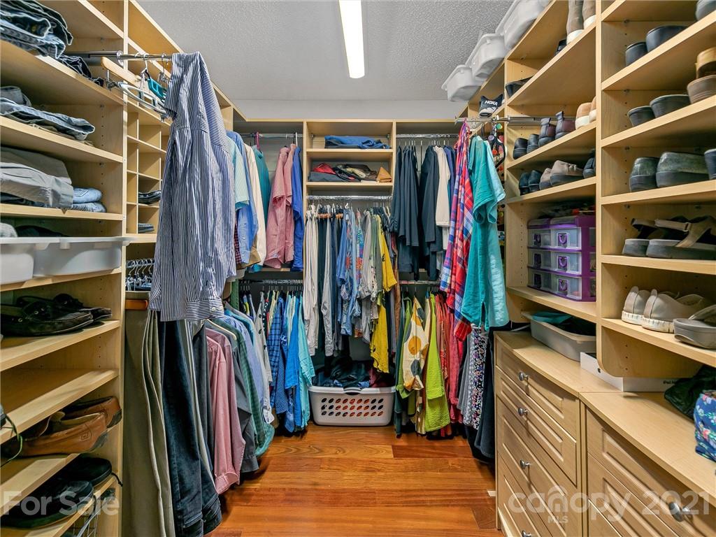 22 Sunset Summit Asheville, NC 28804 - Photo 24 of 42 a view of walk in closet with clothes and shoes
