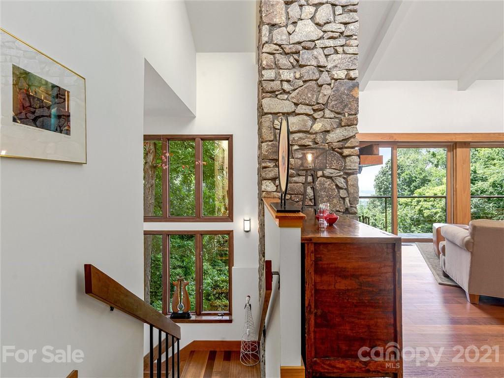 22 Sunset Summit Asheville, NC 28804 - Photo 25 of 42 a living room with furniture and a window
