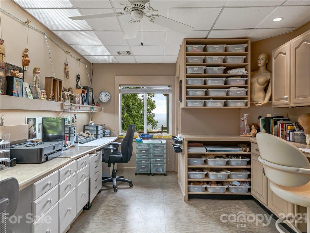 22 Sunset Summit Asheville, NC 28804 - Photo 32 of 42 a kitchen with a refrigerator and a sink