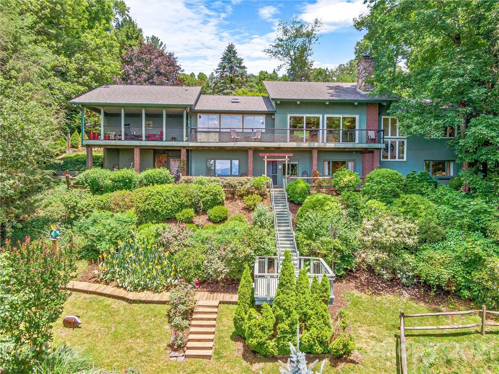 22 Sunset Summit Asheville, NC 28804 - Photo 33 of 42 a front view of a house with a yard