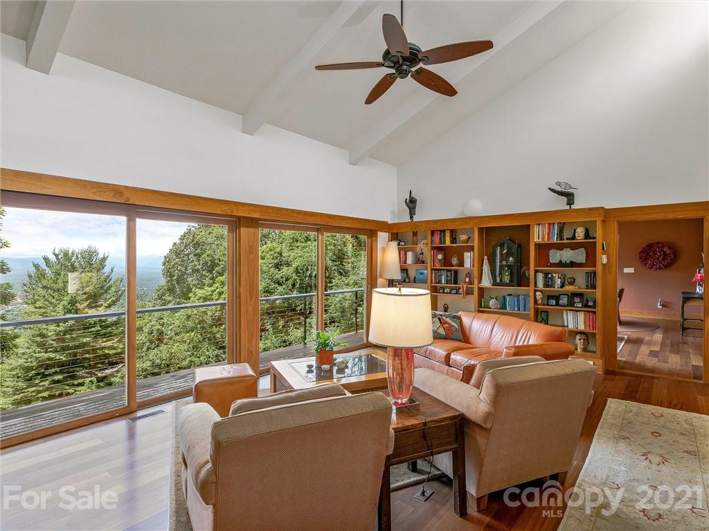 22 Sunset Summit Asheville, NC 28804 - Photo 6 of 42 a living room with fireplace furniture and a large window