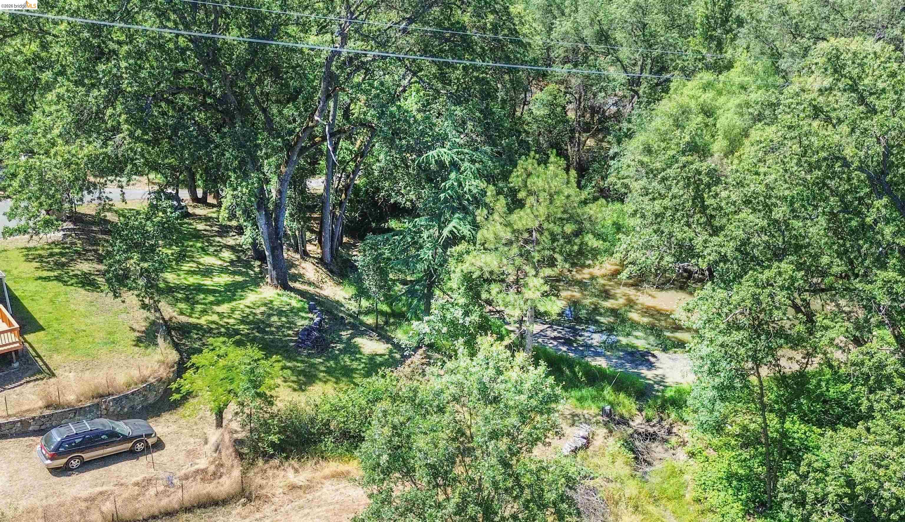 13904 Tuolumne Road Sonora, CA 95370 - Photo 40 of 44 Lush wooded landscape with mature trees and natural terrain