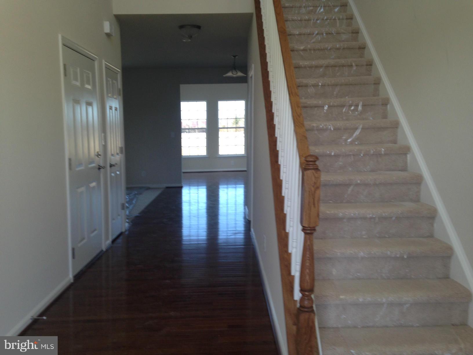 5279 Longbow Road King George, VA 22485 - Photo 12 of 30 a view of entryway and hall with wooden floor