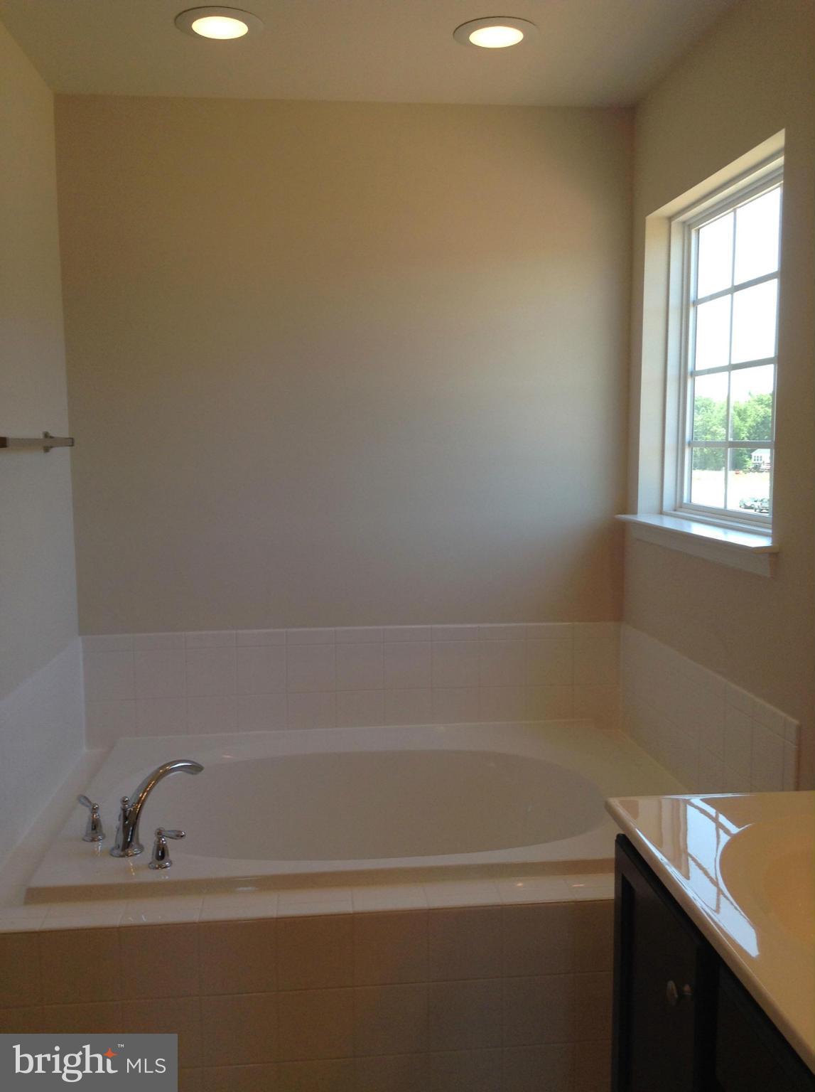 5279 Longbow Road King George, VA 22485 - Photo 21 of 30 a bathroom with a bathtub