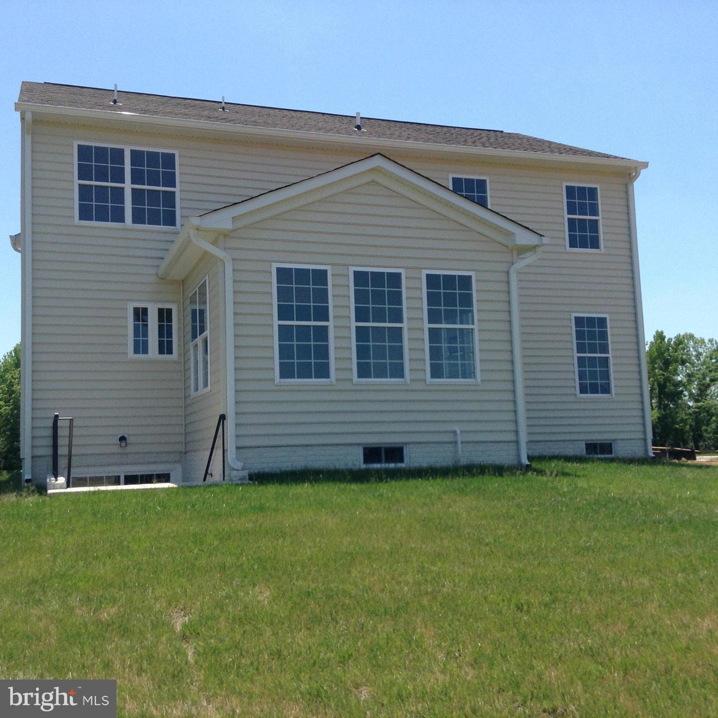 5279 Longbow Road King George, VA 22485 - Photo 27 of 30 a view of a house with a yard