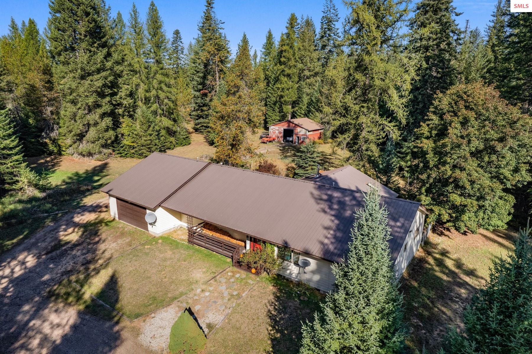 484 Gold Creek Road Sandpoint, ID 83864 - Photo 1 of 1 Tidy homestead on treed acreage
